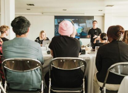 man speaking at a corporate workshop