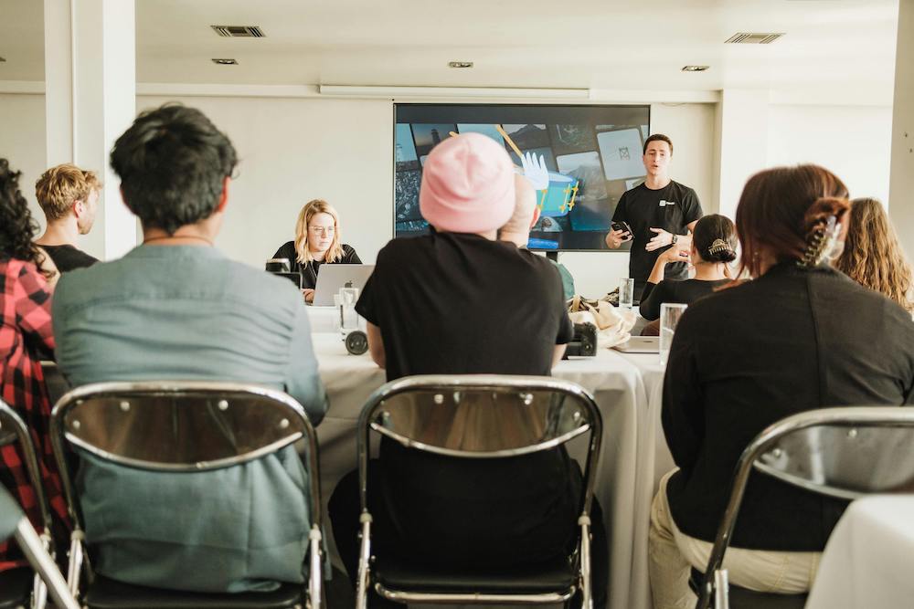 man speaking at a corporate workshop